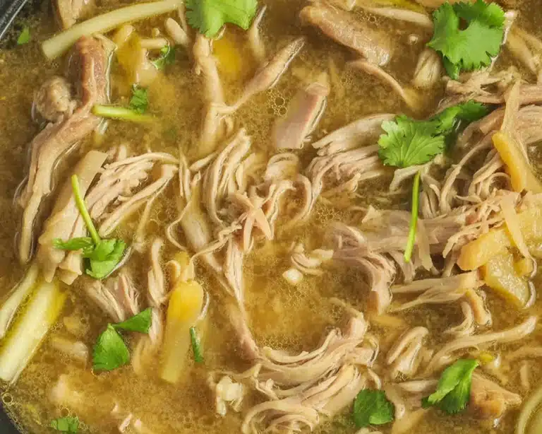 Delicious Salsa Verde Pulled Pork served for tacos with fresh ingredients.