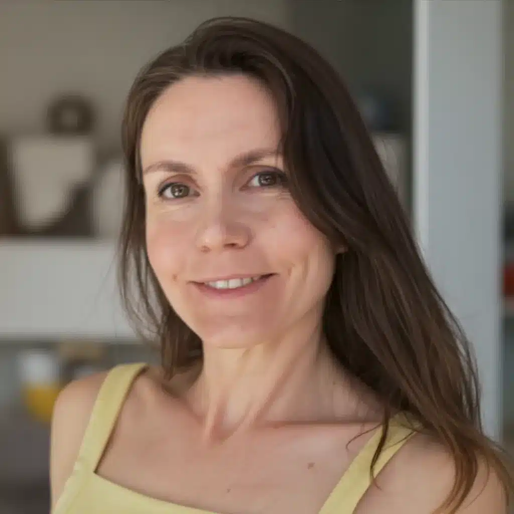 Lila-Morrison-summer Lila at kitchen in summer with genuine, comforting smile