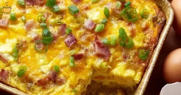 Delicious breakfast casserole with eggs, cheese, and vegetables baked to perfection.