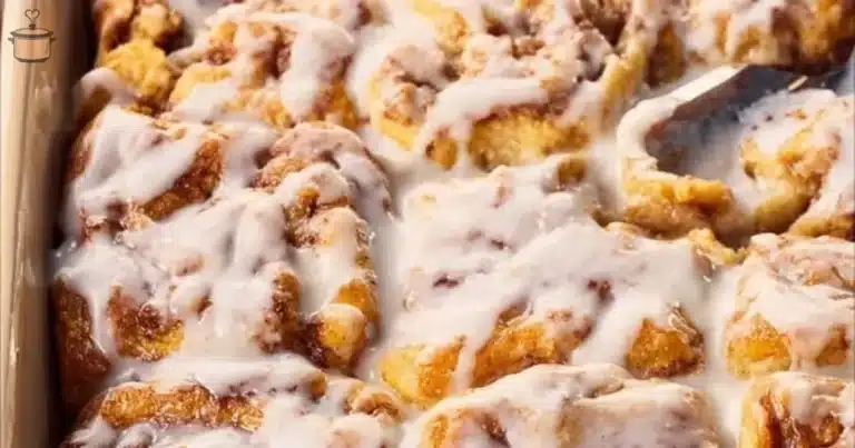 Cinnamon Roll Breakfast Bake served on a plate with frosting