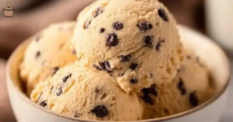 Bowl of homemade edible chocolate chip cookie dough with chocolate chips.