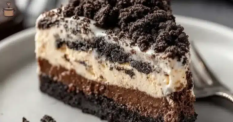 Delicious Oreo Dump Cake topped with crushed Oreos and whipped cream