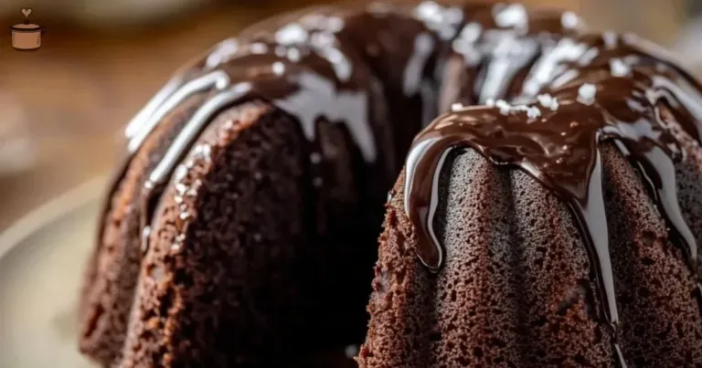 Bundt-style chocolate ganache cake topped with rich chocolate drizzle.