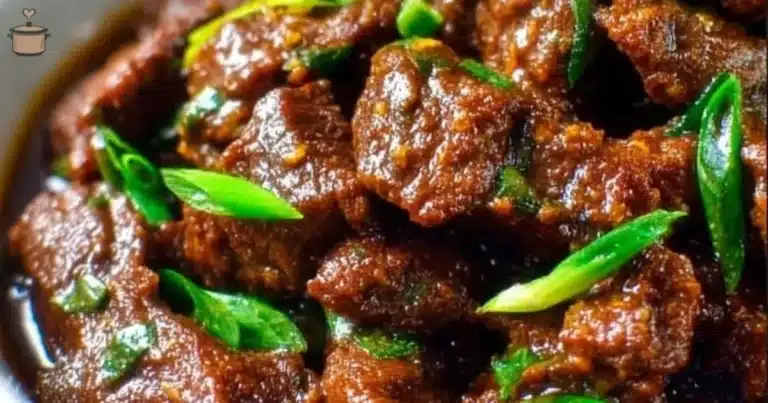 Delicious Slow Cooker Mongolian Beef served with steamed rice and vegetables