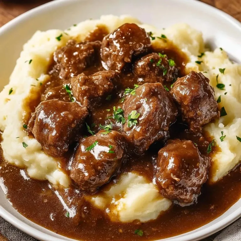Delicious beef tips served with rich gravy on a plate