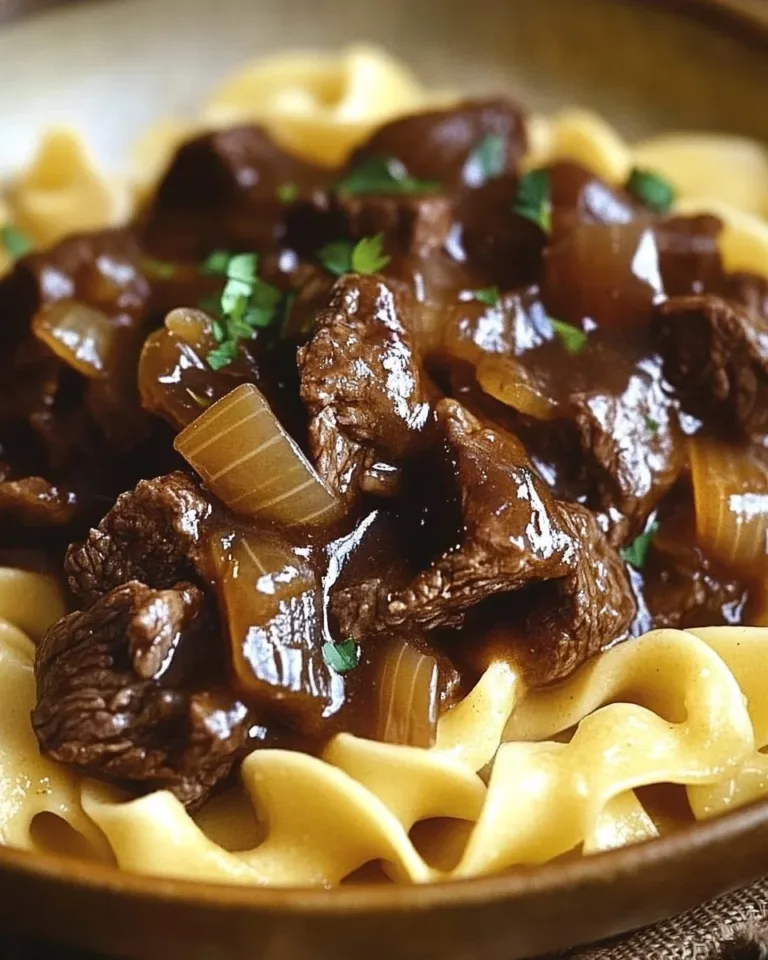 Easy one-pot French Onion Beef and noodles dish served in a bowl.